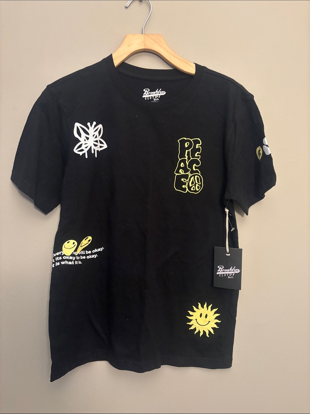 Brooklyn Supply Co. Black Graphic 'Peace' Tee with Yellow Accents